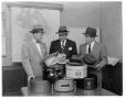 Photograph: [Mayor Charles McAden and others holding hats on Felt Hat Day]