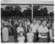 Photograph: [Crowd in front of Kentucky Fried Chicken stand]