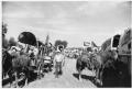 Photograph: Texas Sesquicentennial Wagon Train on Its Way from Gainesville to Whi…