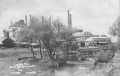 Primary view of [Sugar mill in Sugar Land, canal in front]
