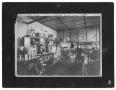 Photograph: [Interior of Motorcycle Shop]