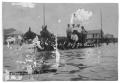 Photograph: [Horse-Drawn Carriage Through Flood Waters]