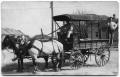 Photograph: [Men on Wells Fargo Wagon]