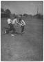 Photograph: [Photograph of Boys Playing Football in Exline Park]