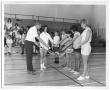 Primary view of [Photograph of Students Learning Badminton Serves]