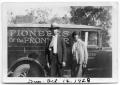 Photograph: [Fleet and Etha Pruden standing in front of truck]