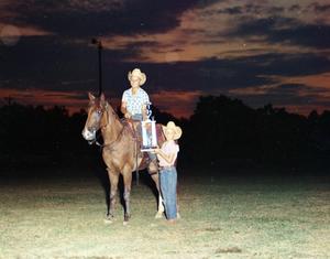 Primary view of object titled '[Two Boys at Beaumont AQHA Show]'.