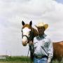 Photograph: [Dean Leonard with a Paint Horse]