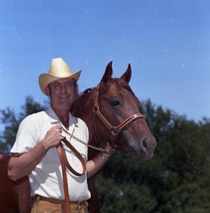 Primary view of object titled '[Man with Horse on Barrachone Ranch]'.