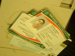Primary view of object titled '[Close-up of identification cards]'.