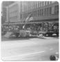 Photograph: [Houston Mexican Chamber of Commerce float in front of Kress building]