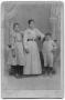 Photograph: [Photograph of two girls and a boy]