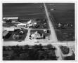 Photograph: [Aerial View of Danevang Farmers Co-op and Surrounding Properties]