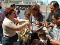 Photograph: [People buy supplies for Palm Sunday]