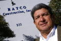 Photograph: [Ray Gomez in front of building]