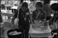 Photograph: [Alabama-Coushatta Women Fry Bread]