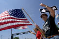 Photograph: [Dallas anti-immigrant protester with American flag]