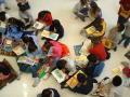 Photograph: [Students at Seminary Hills Elementary gather to read books]