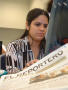 Photograph: [Aracelis Acevedo works on a computer as she writes for El Reportero …