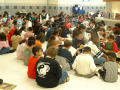 Primary view of [Students read books in a group at Seminary Hills Elementary]