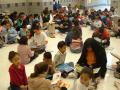 Primary view of [Students gather to read books at Seminary Hills Elementery]