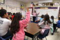 Photograph: [Delisse Hardy conducts class at Crockett Elementary]