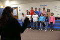 Photograph: [Students listen to their instructor at Crockett Elementary]