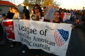 Photograph: [Marchers carry a banner for the League of United Latin American Citi…