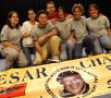 Photograph: [Students pose in front of a banner promoting a Cesar Chavez Day]