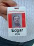 Photograph: [Close-up of Edgar Vera's name badge]