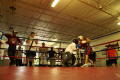 Primary view of [Two students practicing in the boxing ring]