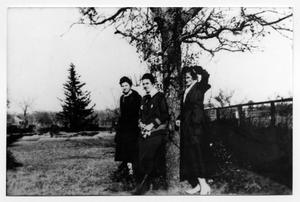 Primary view of object titled '[Estella Kettner and Friends Standing by a Tree]'.