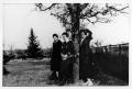 Primary view of [Estella Kettner and Friends Standing by a Tree]