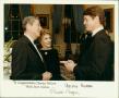 Photograph: [Charles Wilson with Reagans]