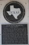 Photograph: [Texas Historical Commission Marker: Jesse Elvis Hendricks Log Cabin]