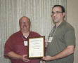Primary view of [Matt VanLandeghem accepts scholarship award at the 2012 annual meeting banquet]