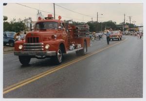 Primary view of object titled '[Fire Truck in a League City Parade]'.