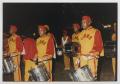 Photograph: [Drumline Performing at a Holiday Festival]