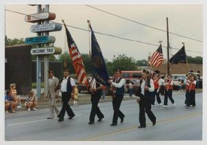 Primary view of object titled '[American Legion Members in a Parade]'.