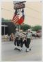 Photograph: [Uniformed Flag Bearers in a Parade]