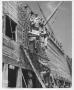 Photograph: Troops Climbing Rope Ladder During Maneuvers in WWII