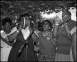 Photograph: [Women of the Voices of Zion Community Choir Singing and Clapping]