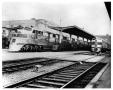 Photograph: [Two trains at Dallas' Union Station]