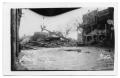 Primary view of [Chaparral Street north of drug store with storm debris]