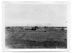 Primary view of object titled '[Cars overturned on the beach]'.