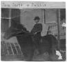 Photograph: [Thomas McGee Scott on his horse Sallie]