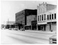 Photograph: [View of Spring Street facing the Businesses]