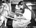 Photograph: [Pat Shelton Weaving on a Loom]