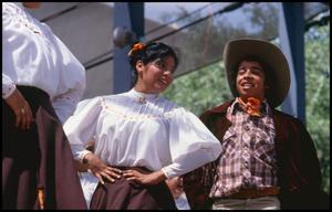 Primary view of object titled '[Ballet Folklorico de San Antonio dancers at the Texas Folklife Festival]'.