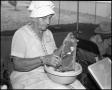 Photograph: [Emilie Bethke Making Pickles and Jelly]